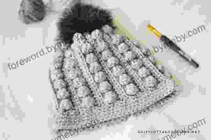 A Close Up Of The Cable And Bobble Stitches Used In The Ornament Beanie Ornament Beanie Knitting Pattern 7 Sizes Included