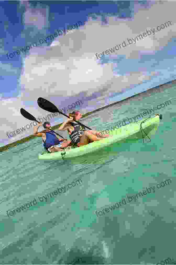 A Couple Paddling A Kayak Through The Clear Waters Of The Pacific Ocean, Surrounded By Lush Green Islands And Blue Skies. The Happy Isles Of Oceania: Paddling The Pacific