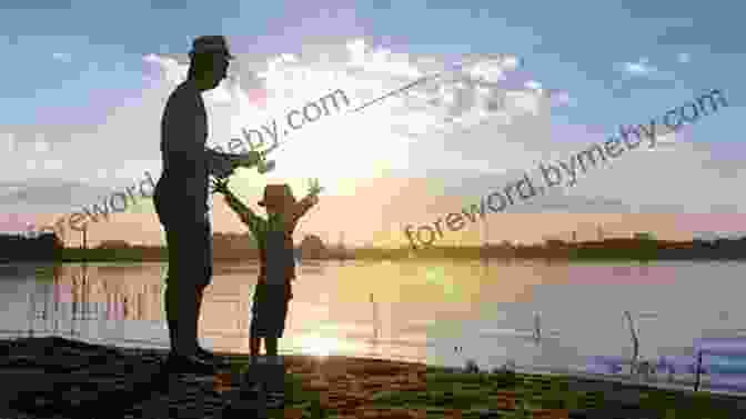 A Father And Son Sit On The Bank Of A River, Watching The Sunset Paint The Sky With Hues Of Orange And Purple. Reading The Water: Fly Fishing Fatherhood And Finding Strength In Nature