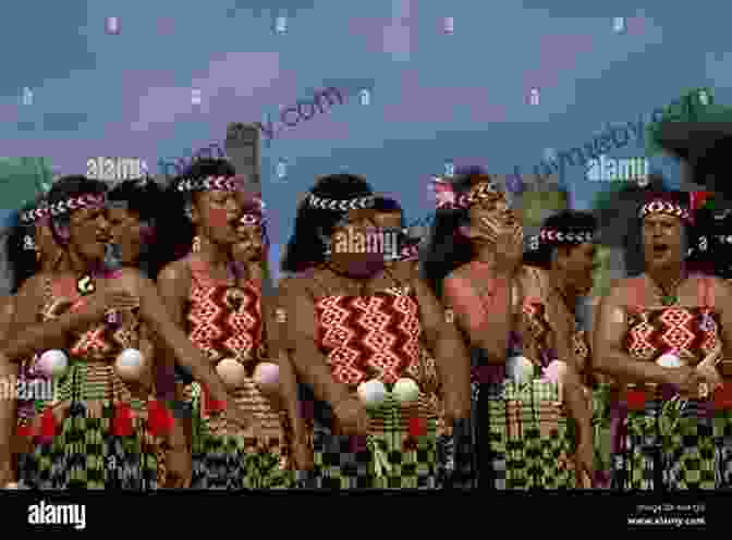 A Group Of Pacific Islanders Performing A Traditional Dance, Wearing Colorful Tribal Attire. The Happy Isles Of Oceania: Paddling The Pacific