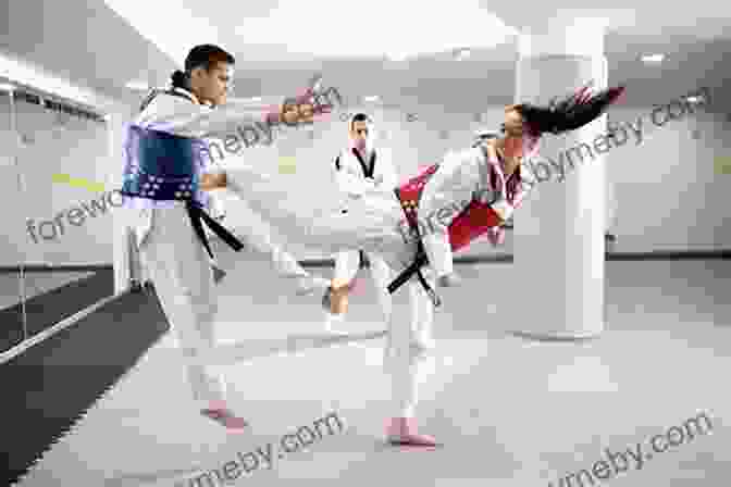 A Group Of Tae Kwon Do Students Practicing Kicks And Punches, Showcasing Their Physical Fitness. Taekwondo: A Comprehensive Guide To Tae Kwon Do Techniques Basics And Tenets For Beginners Wanting To Master This Martial Art (Mix Martial Arts)