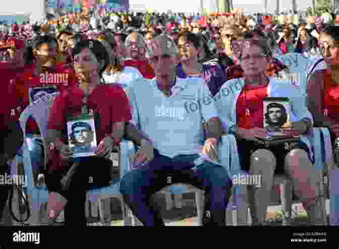 A Photo Of A Group Of People Holding Up Posters Of Che Guevara The Bolivian Diary Ernesto Che Guevara