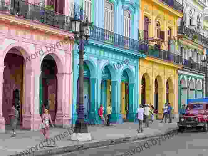 A Vibrant Street Scene In Havana Vieja, With Colorful Buildings And People Walking By Havana Tips And Tricks: Interesting Facts And Tips On Havana And Cuba (With Trinidad Bonus Section)