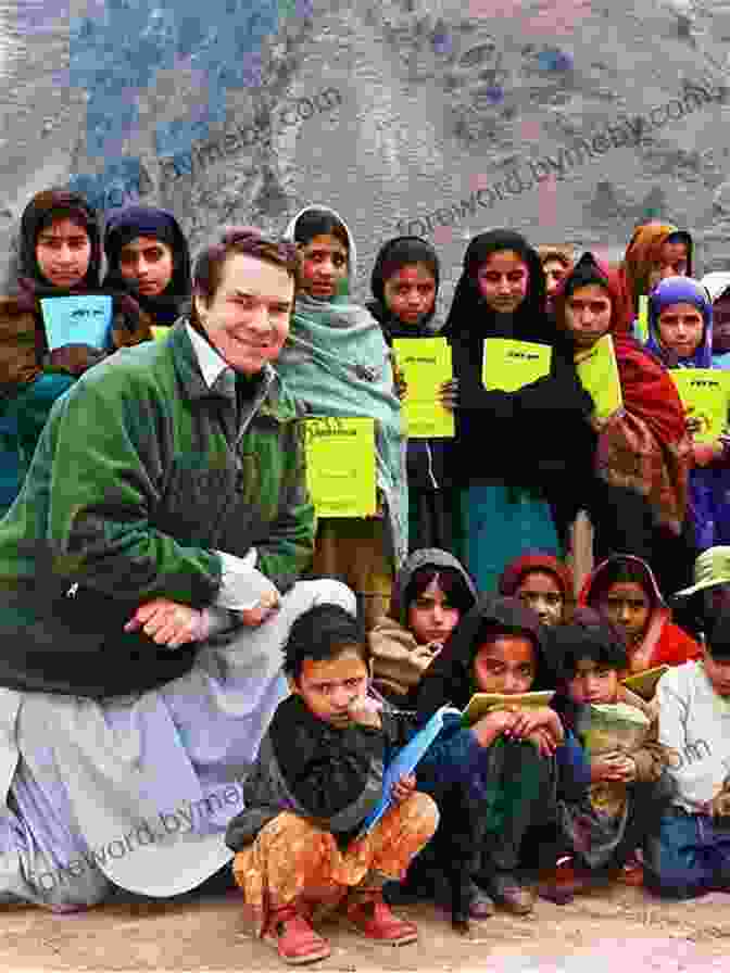 Greg Mortenson With A Group Of Children In Pakistan Alive And Well In Pakistan A Human Journey In A Dangerous Time