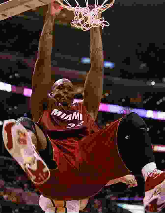 Shaquille O'Neal Dunking The Basketball During An NBA Game. Who Is Shaquille O Neal? (Who Was?)